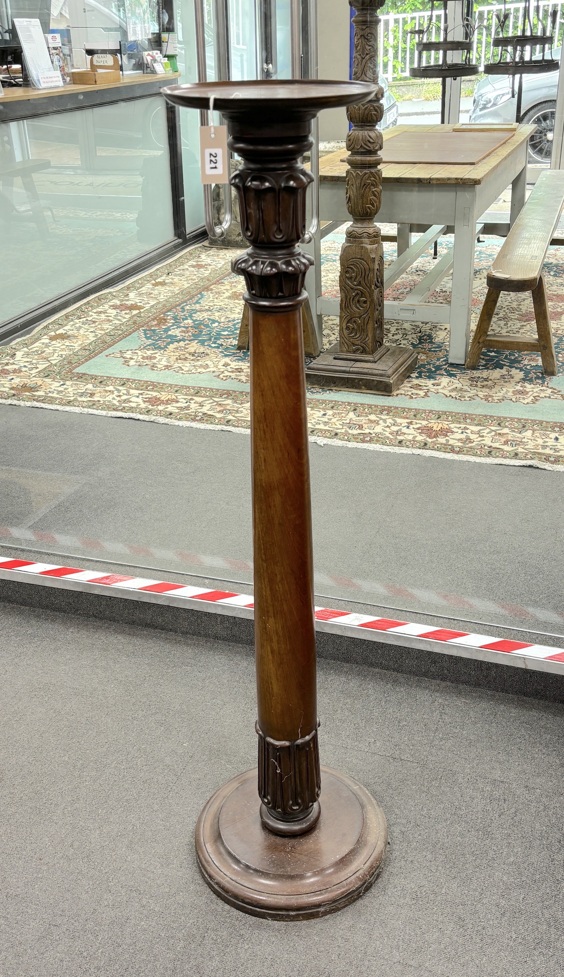 A pair of William IV and later mahogany ‘bedpost’ torchere stands, height 139cm
